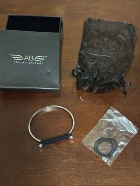 Ashley Bridget Silver-Tone Women's Bangle with Black Cord Hair tie.